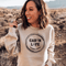 Our Cabin Life sweatshirt is perfect for those who love spending time in the great outdoors, whether it's camping, hiking, or simply enjoying a cozy night in a cabin.